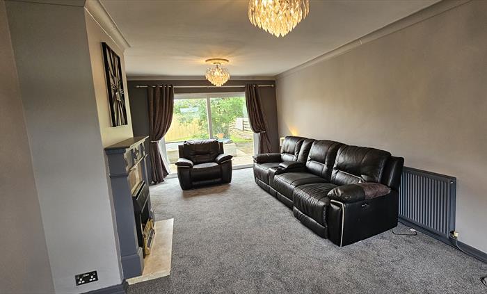 The Redford Cwtch Lounge – a cosy, welcoming space with soft seating, warm lighting, and rustic charm, perfect for relaxing with family or friends aft
